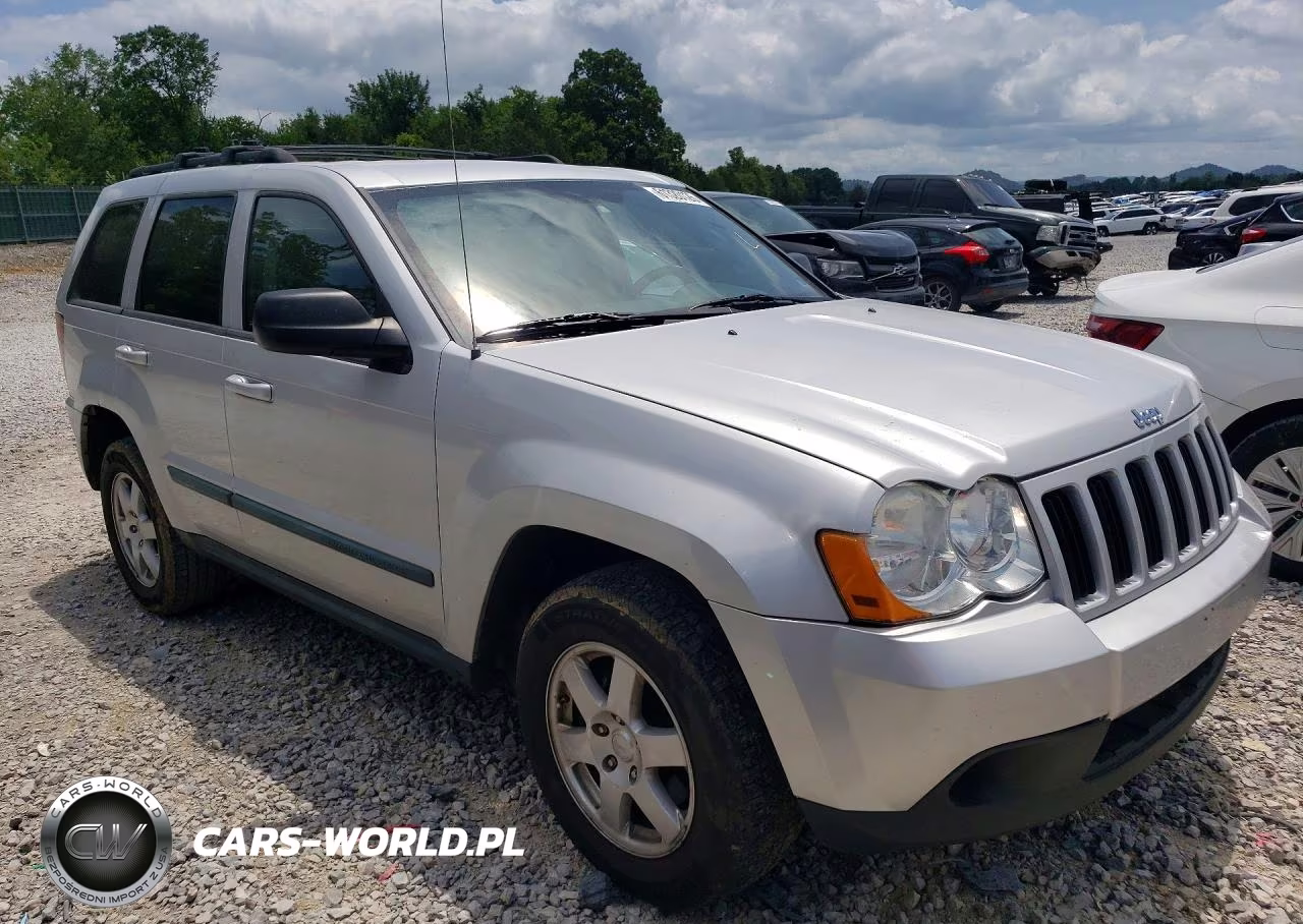 2009 Jeep Grand Cherokee Laredo VIN:1J8GR48K19C510878 - 4