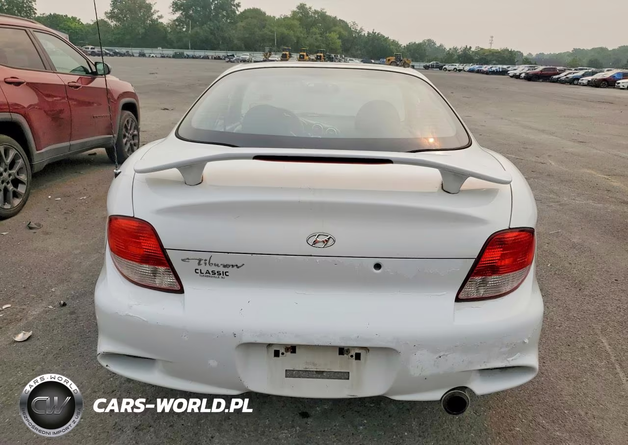 2000 Hyundai Tiburon Base VIN:KMHJG25F9YU217491 - 6