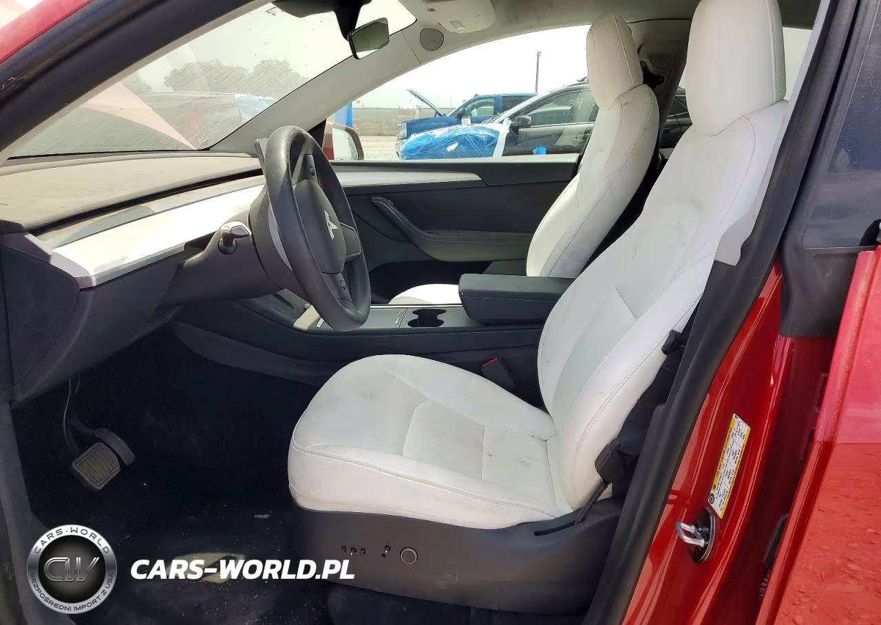 2023 Tesla Model Y VIN:7SAYGDEE7PF601611 - 7