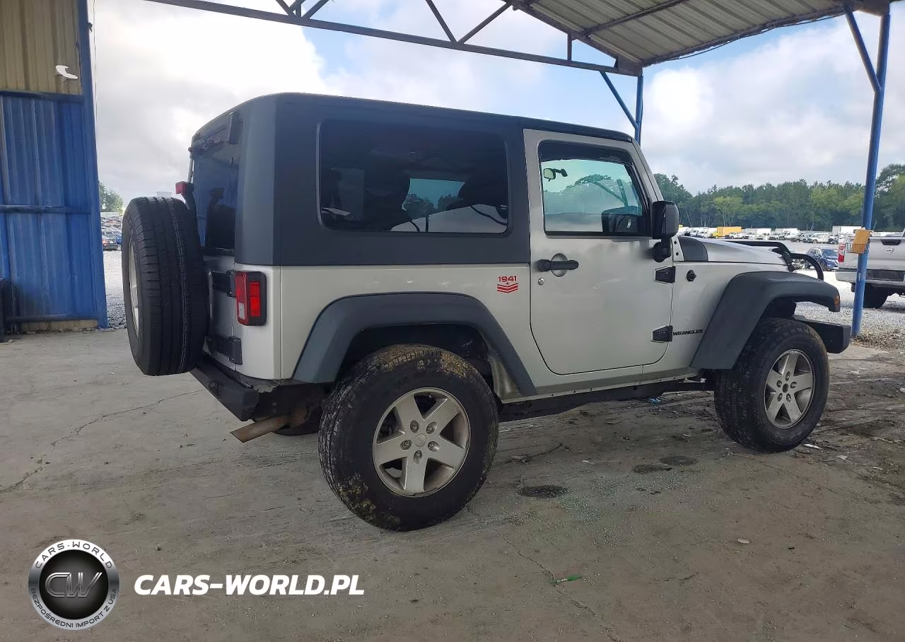 2011 Jeep Wrangler Sahara VIN:1J4AA5D17BL541401 - 3