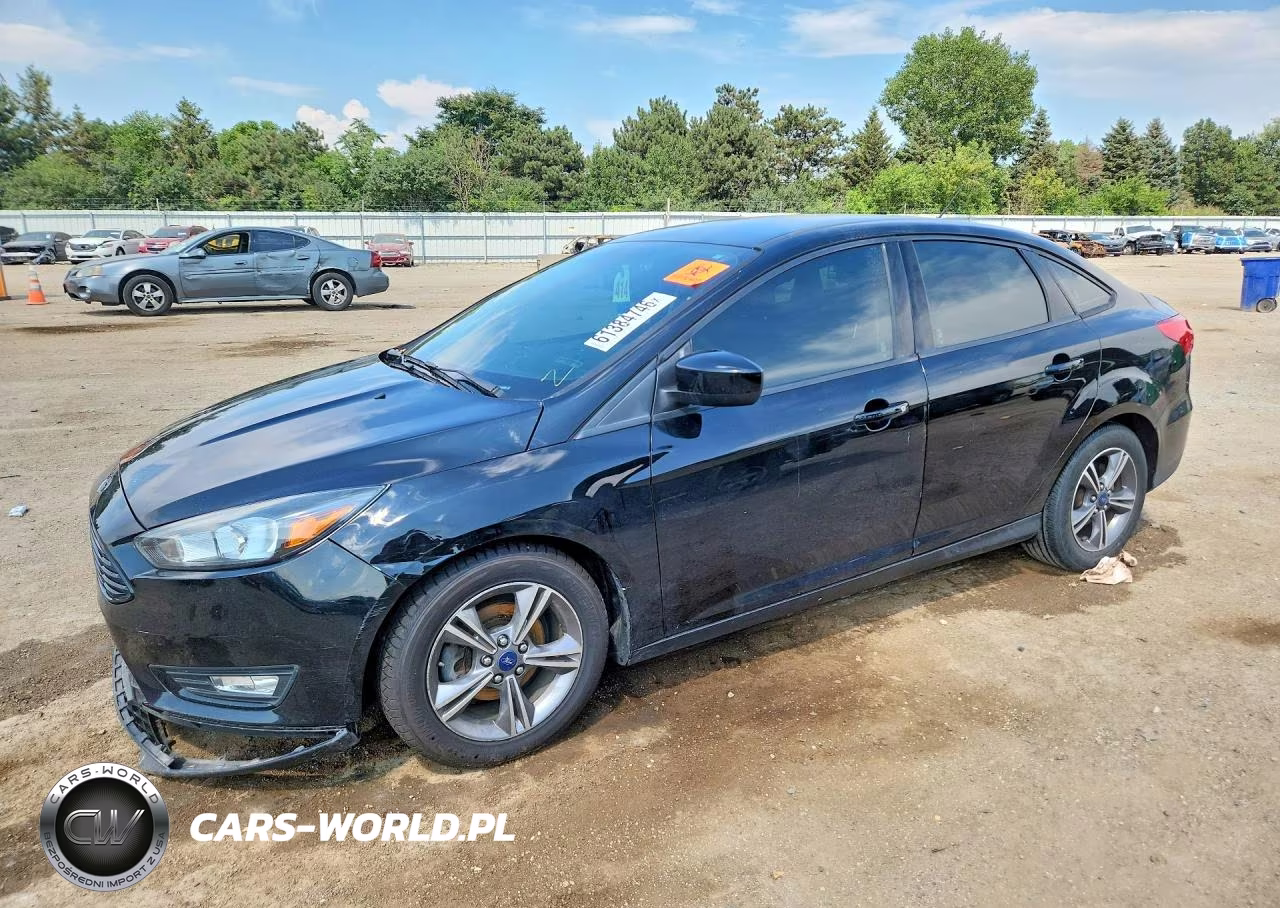 2018 Ford Focus Se VIN:1FADP3FE4JL257248 - 1