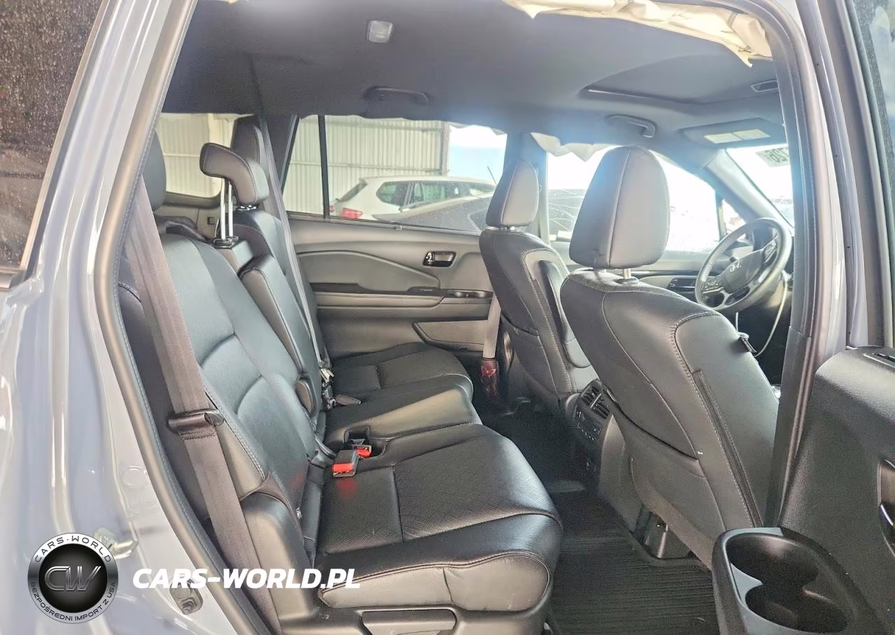 2023 Honda Passport Elite VIN:5FNYF8H06PB001394 - 11