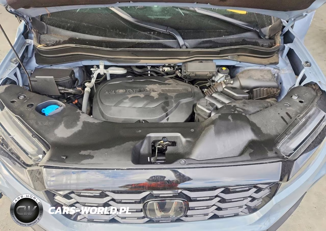 2023 Honda Passport Elite VIN:5FNYF8H06PB001394 - 12