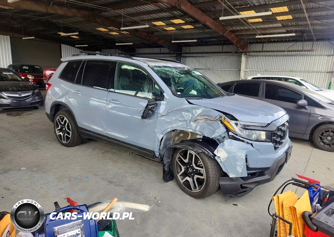 2023 Honda Passport Elite VIN:5FNYF8H06PB001394 - 4