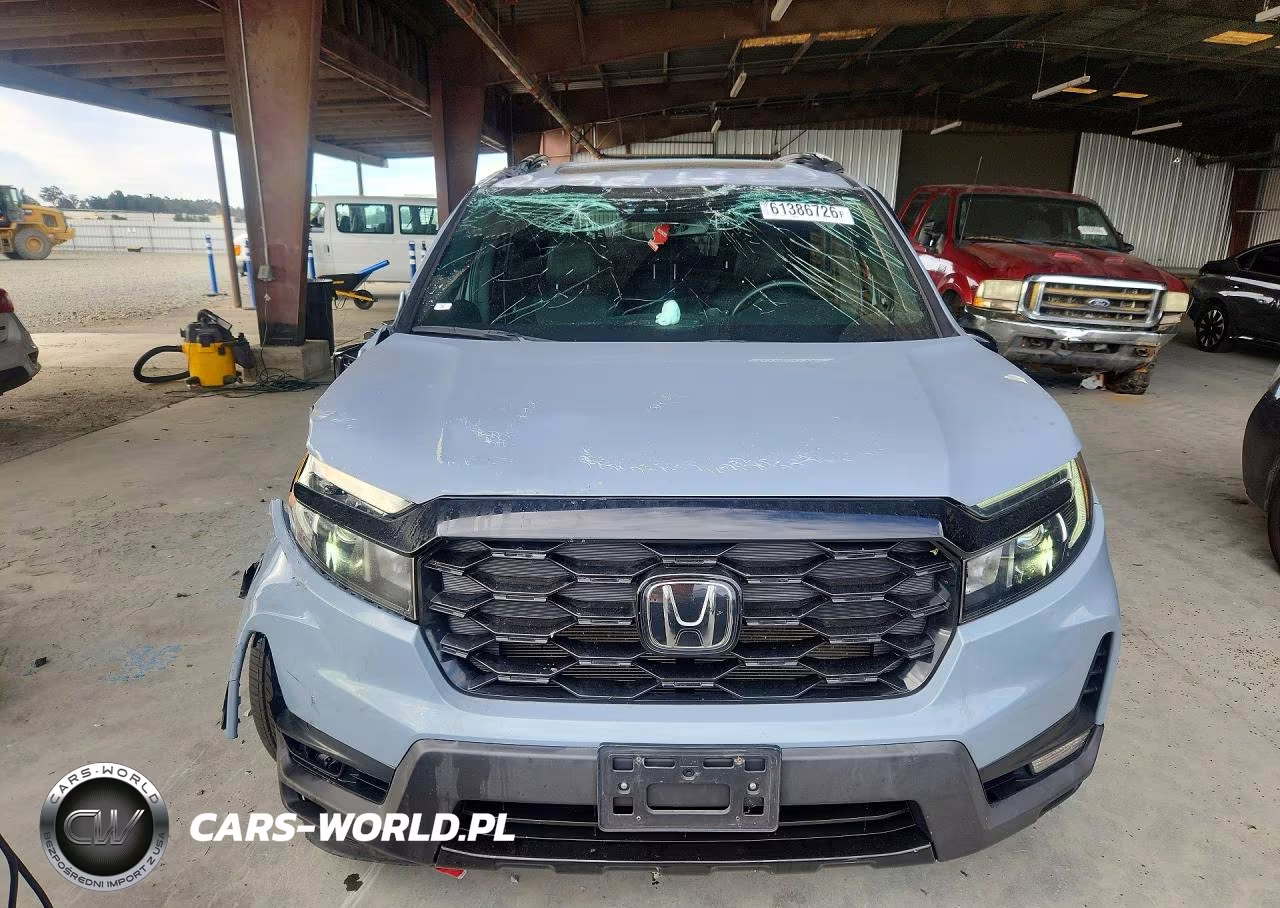 2023 Honda Passport Elite VIN:5FNYF8H06PB001394 - 5