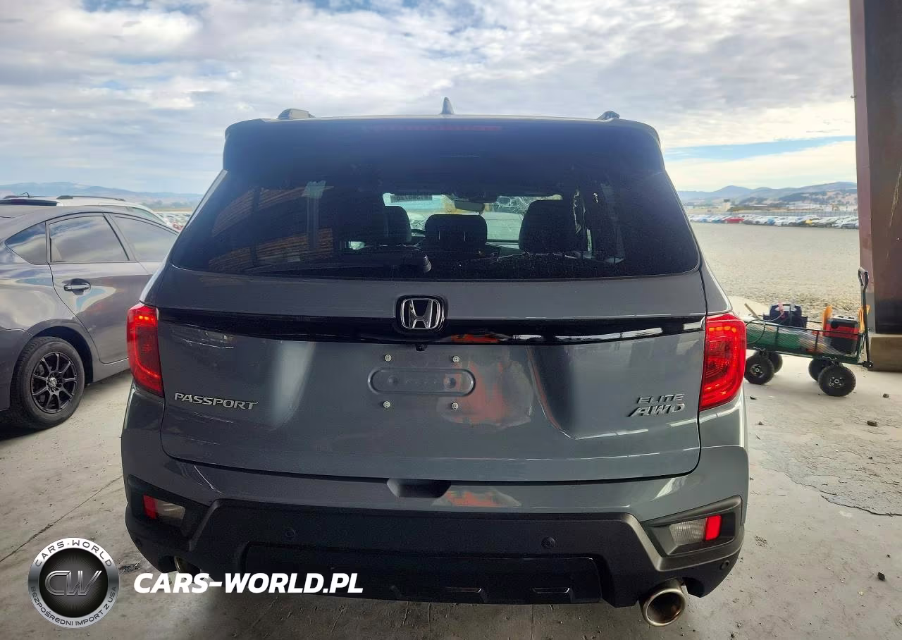 2023 Honda Passport Elite VIN:5FNYF8H06PB001394 - 6