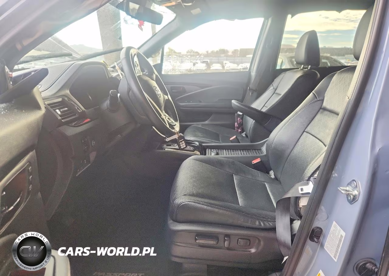 2023 Honda Passport Elite VIN:5FNYF8H06PB001394 - 7