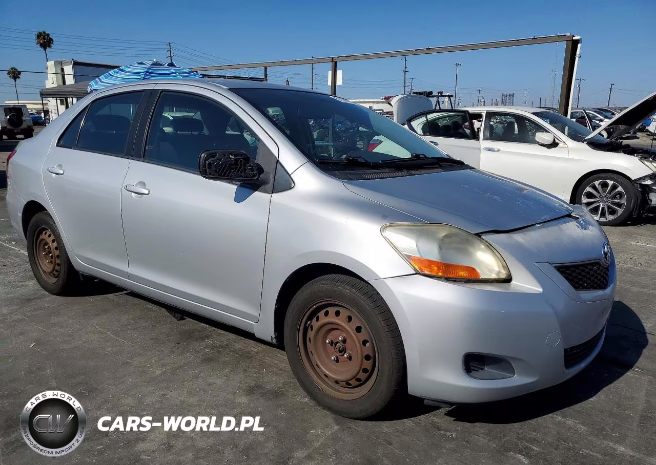2009 Toyota Yaris Base VIN:JTDBT903291321396 - 4