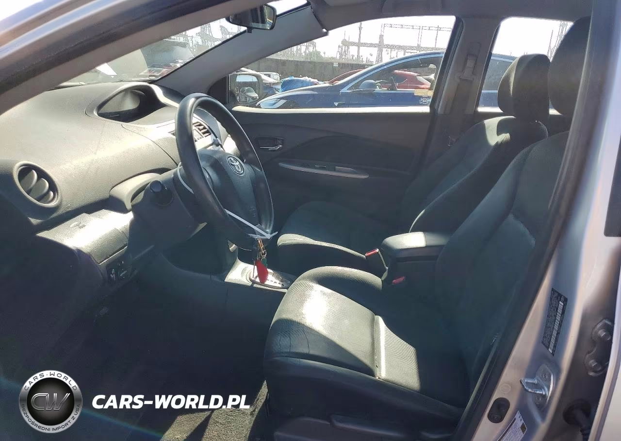 2009 Toyota Yaris Base VIN:JTDBT903291321396 - 7