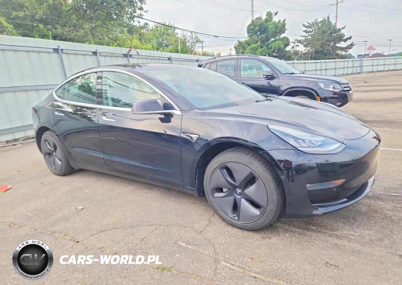2019 Tesla Model 3 VIN:5YJ3E1EA8KF304638 - 4