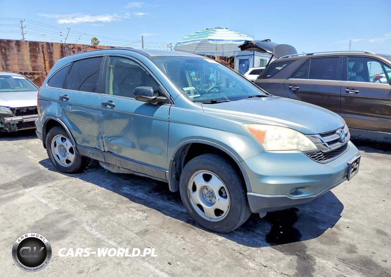 2011 Honda Cr-V Lx VIN:5J6RE3H3XBL041224 - 4