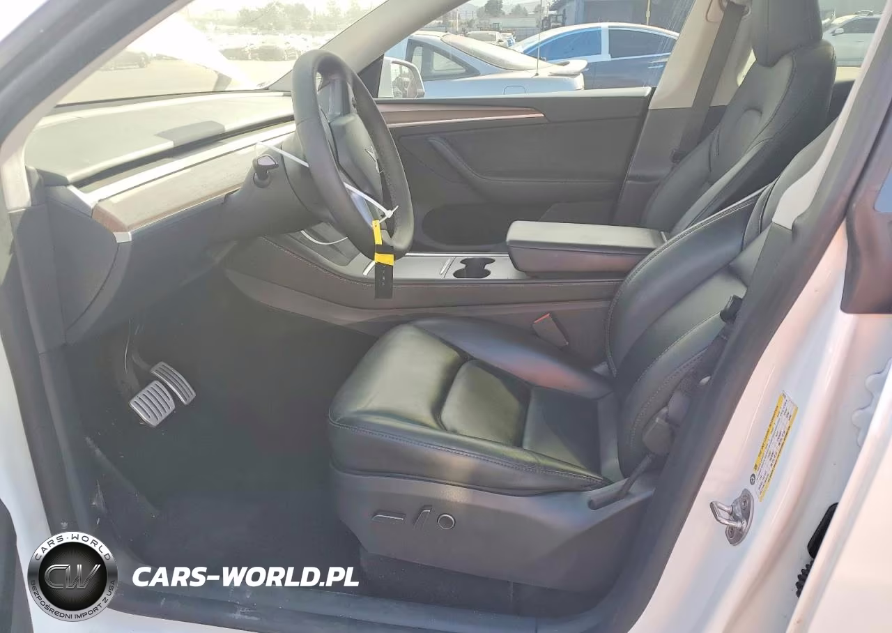 2024 Tesla Model Y VIN:7SAYGDEF6RF128103 - 7