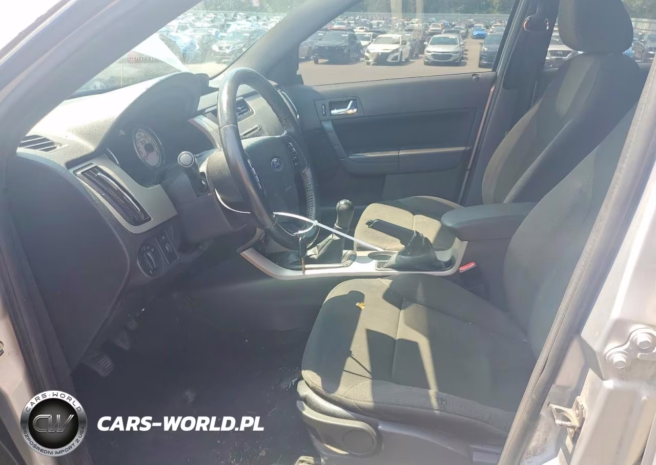 2008 Ford Focus VIN:1FAHP35N58W266939 - 7