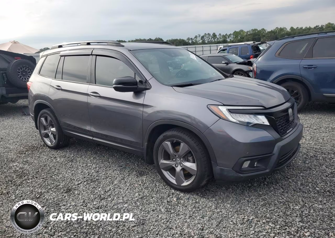 2019 Honda Passport Touring VIN:5FNYF7H92KB001488 - 4