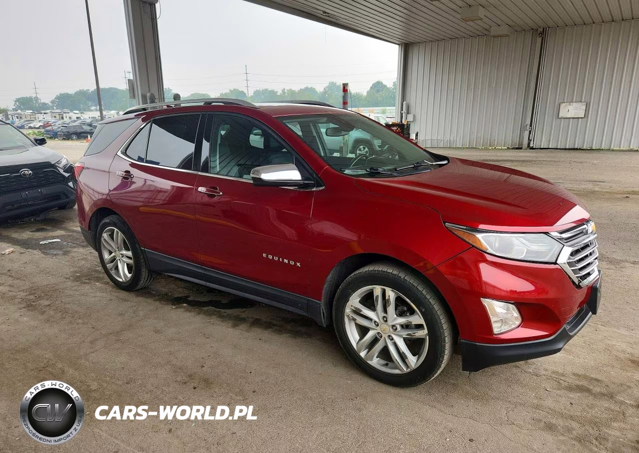 2018 Chevrolet Equinox Premier VIN:2GNAXVEV9J6347750 - 4