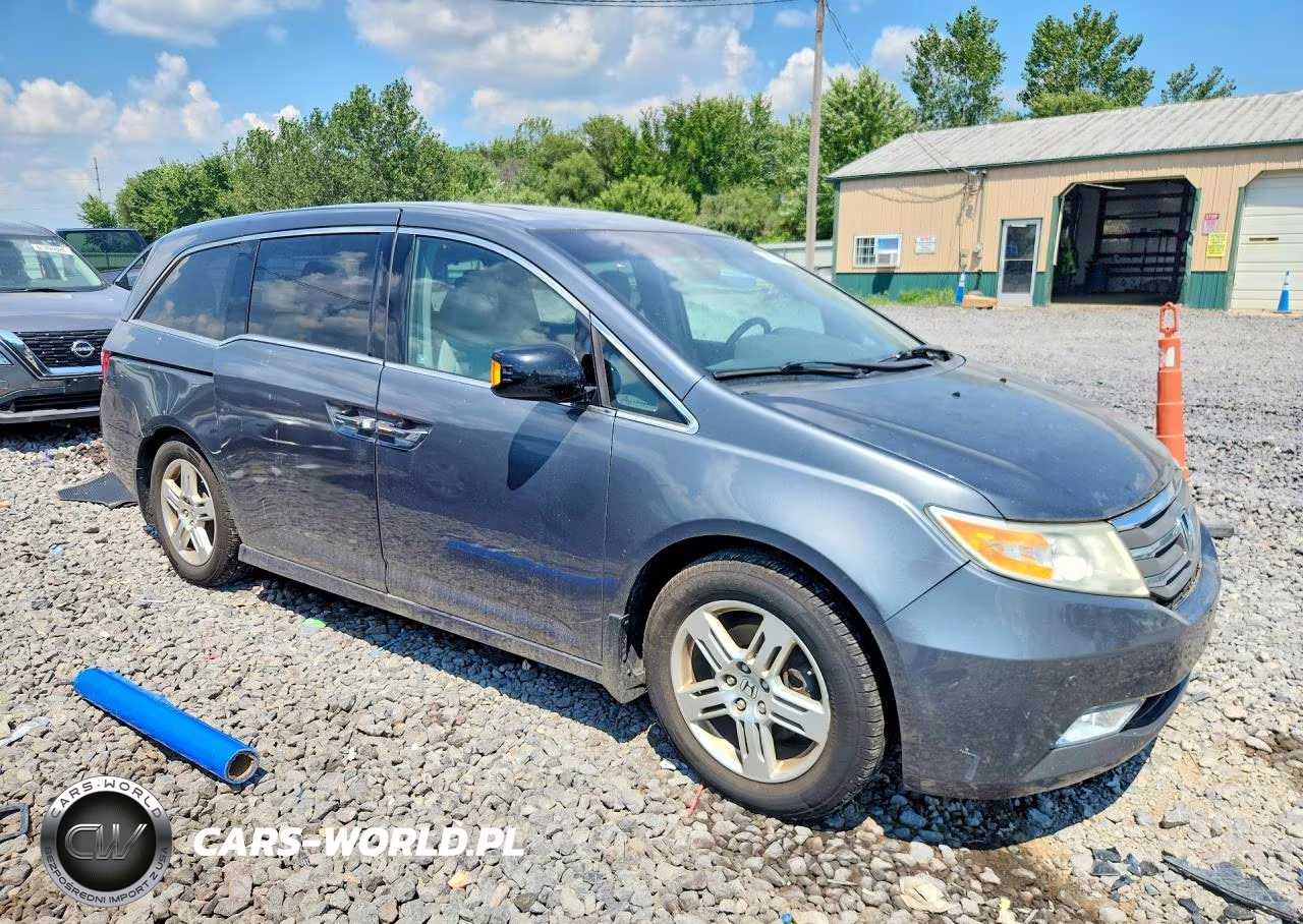 2012 Honda Odyssey Touring VIN:5FNRL5H91CB085483 - 4