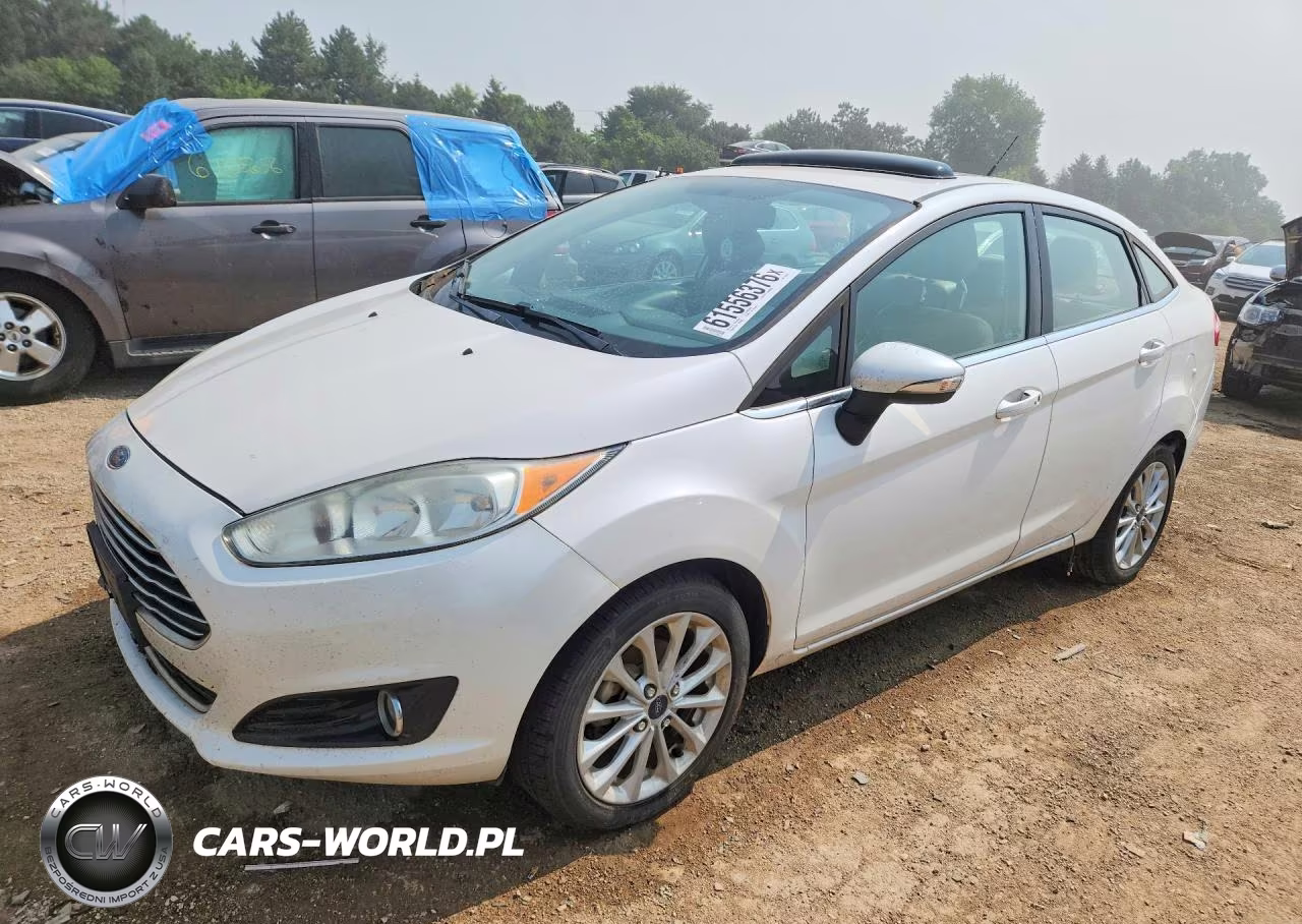 2017 Ford Fiesta Titanium VIN:3FADP4CJ7HM136424 - 1