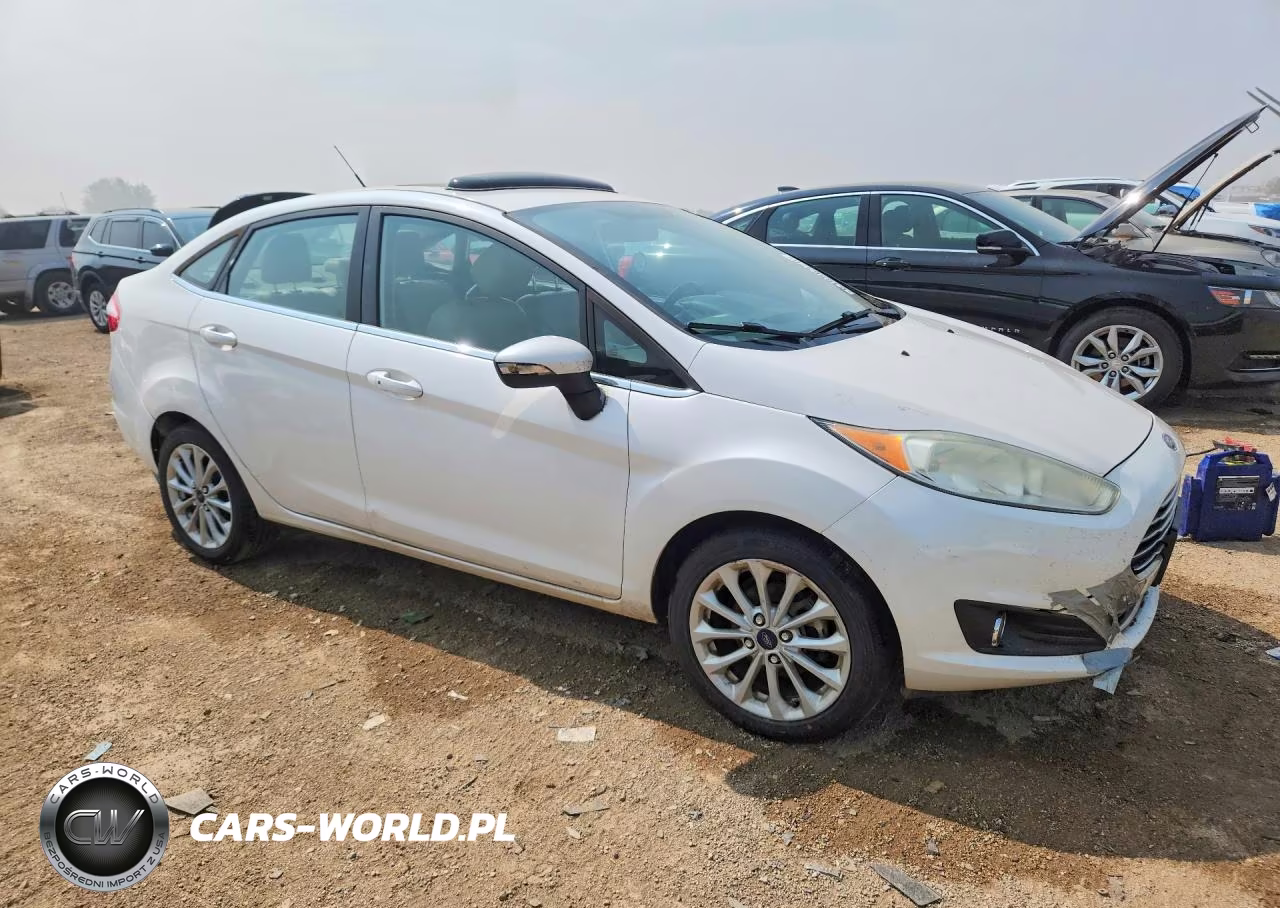 2017 Ford Fiesta Titanium VIN:3FADP4CJ7HM136424 - 4