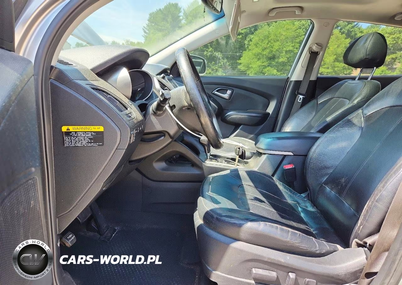 2012 Hyundai Tucson Limited VIN:KM8JUCAC0CU382719 - 7