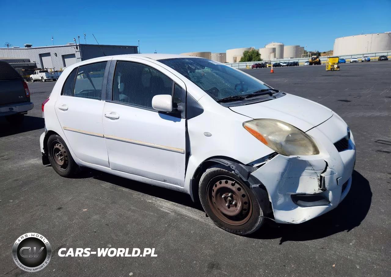 2009 Toyota Yaris Base VIN:JTDKT903995223801 - 4