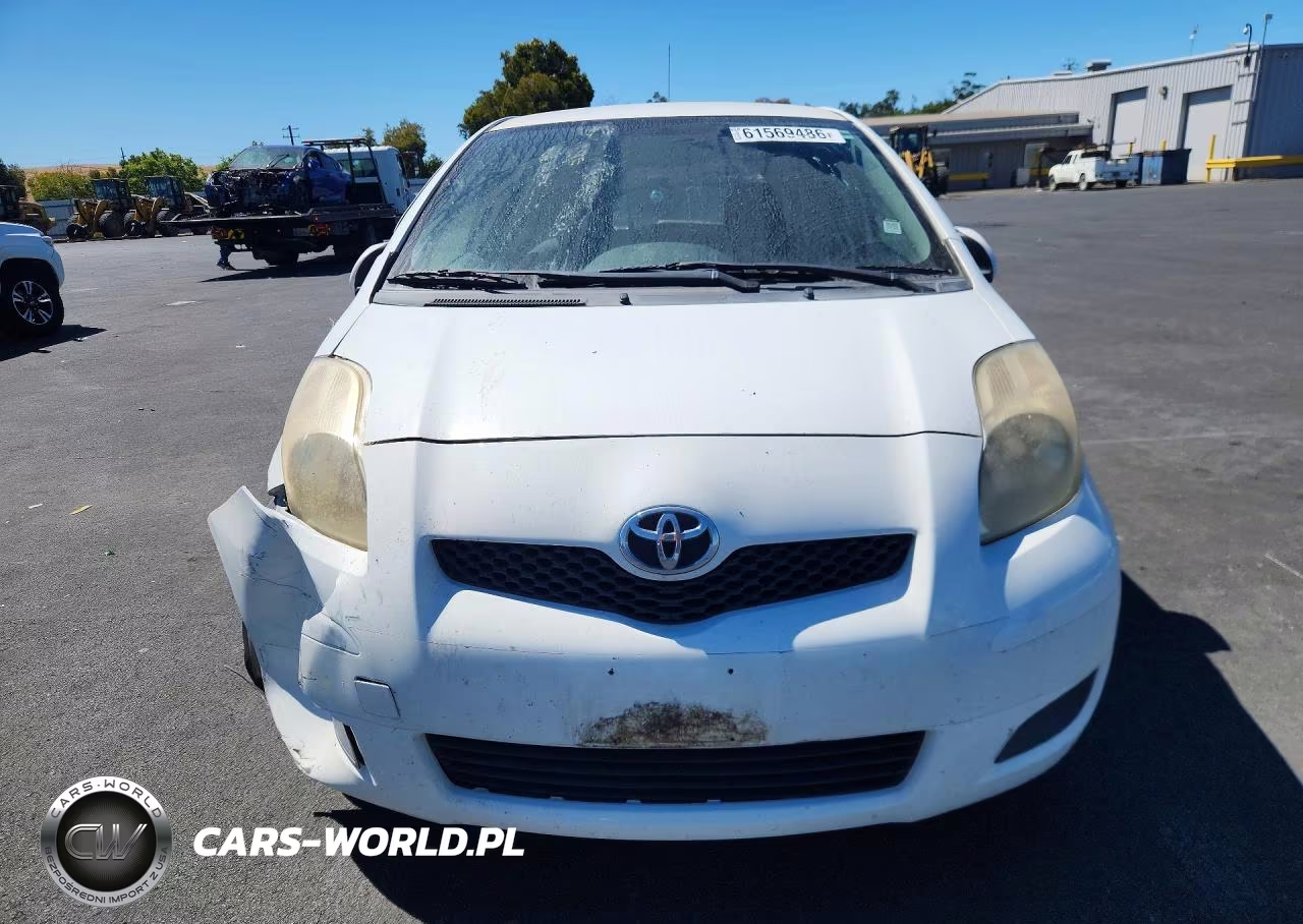 2009 Toyota Yaris Base VIN:JTDKT903995223801 - 5