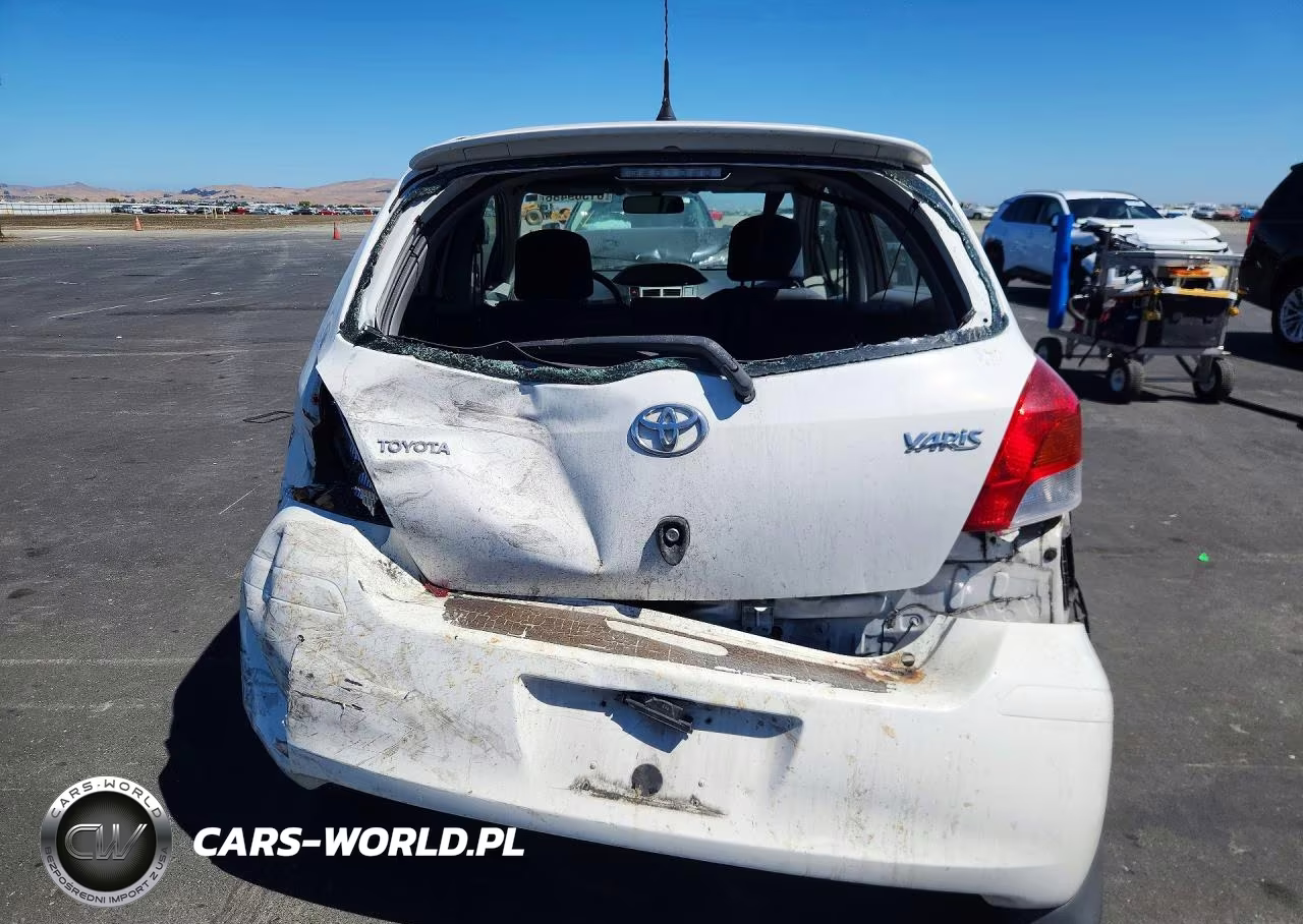 2009 Toyota Yaris Base VIN:JTDKT903995223801 - 6
