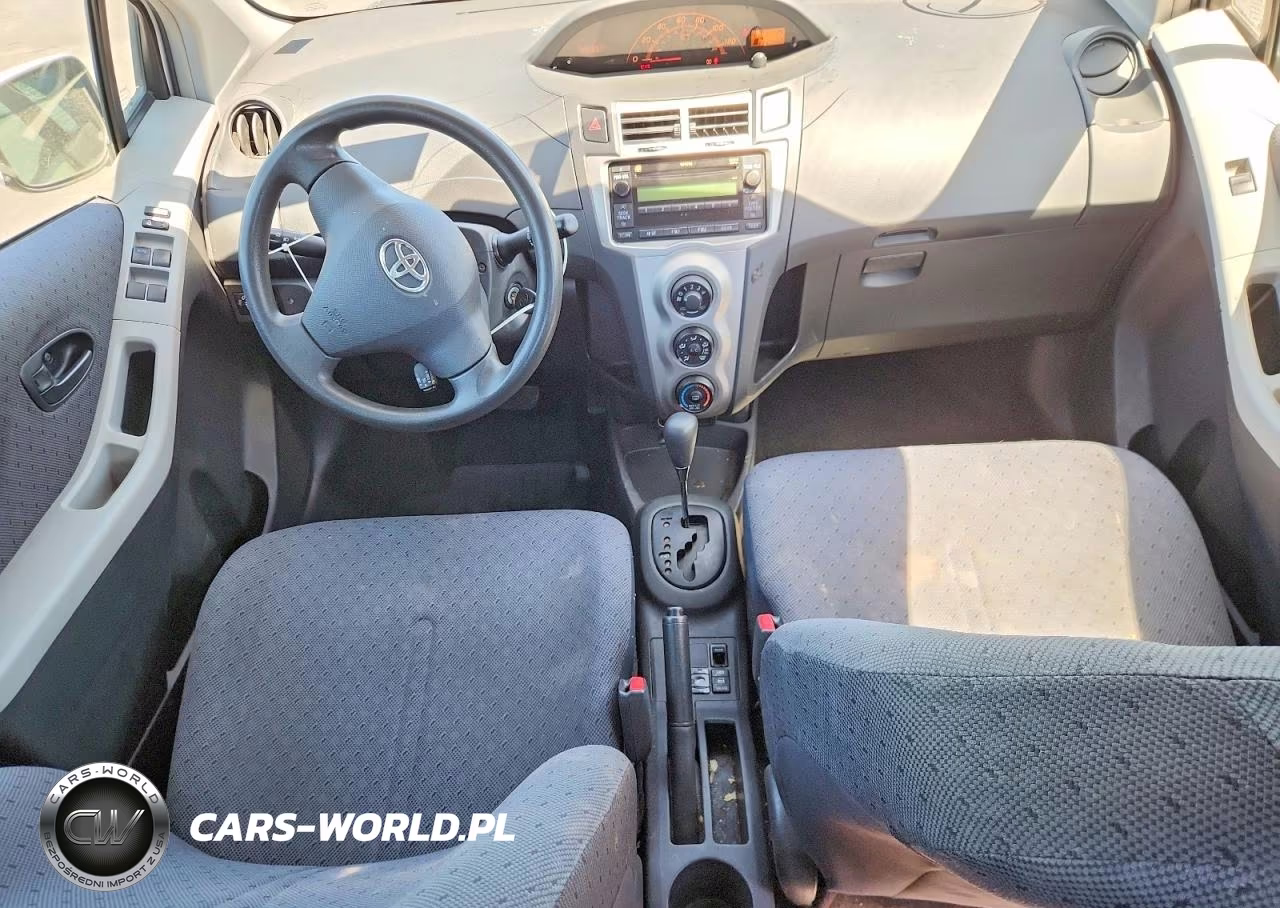 2009 Toyota Yaris Base VIN:JTDKT903995223801 - 8
