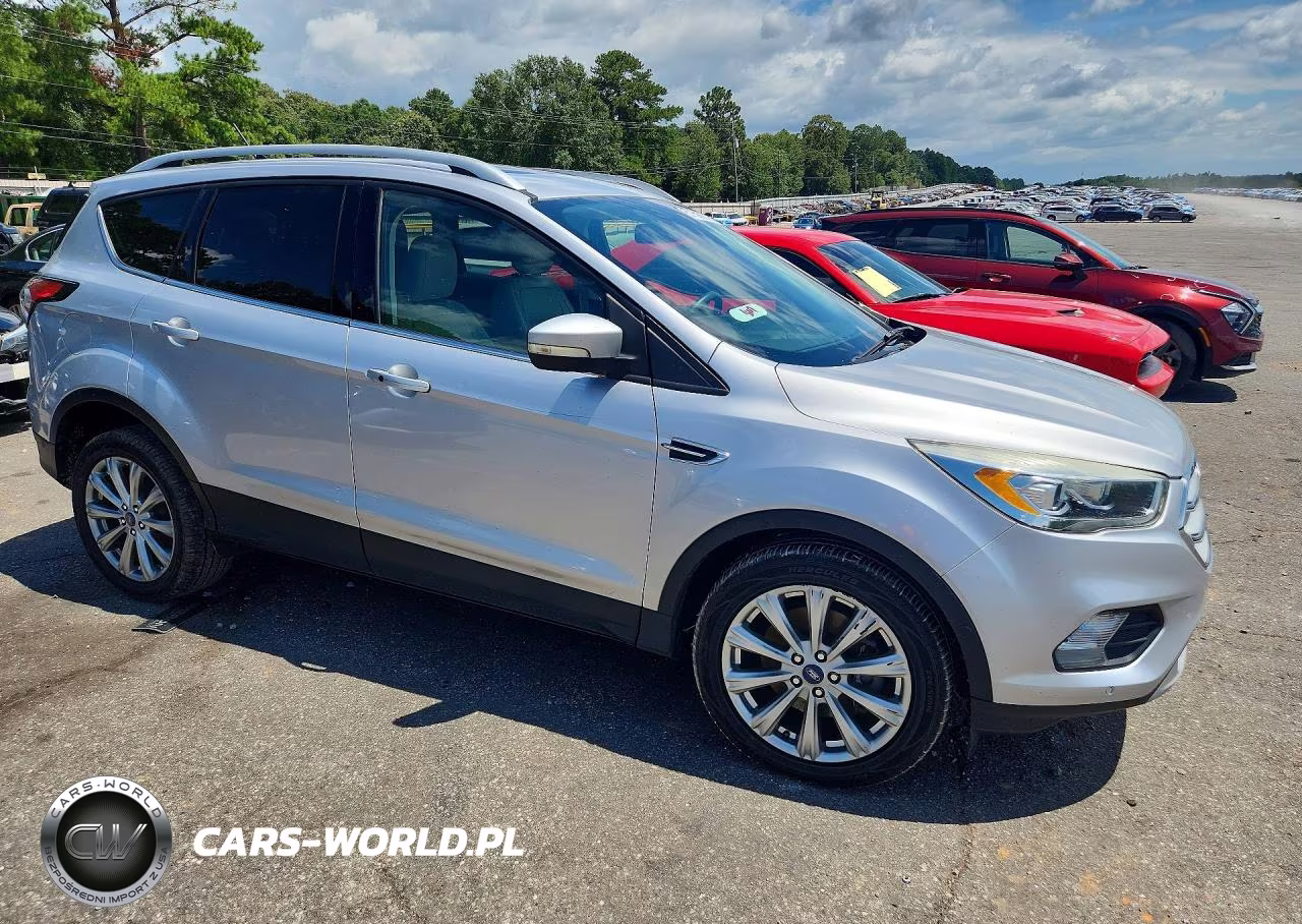 2018 Ford Escape Titanium VIN:1FMCU0J96JUB16758 - 4