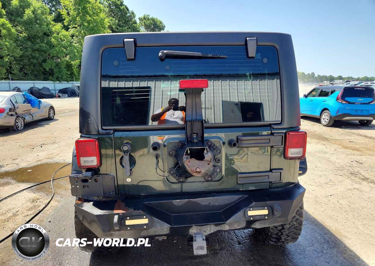 2012 Jeep Wrangler Unlimited Sport VIN:1C4BJWDGXCL113120 - 6