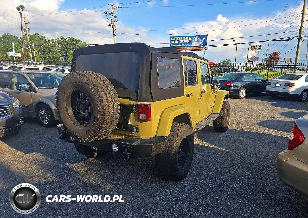 2013 Jeep Wrangler Unlimited Sahara VIN:1C4BJWEG9DL531328 - 4