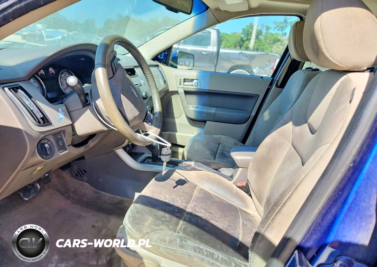 2009 Ford Focus VIN:1FAHP36NX9W150720 - 7