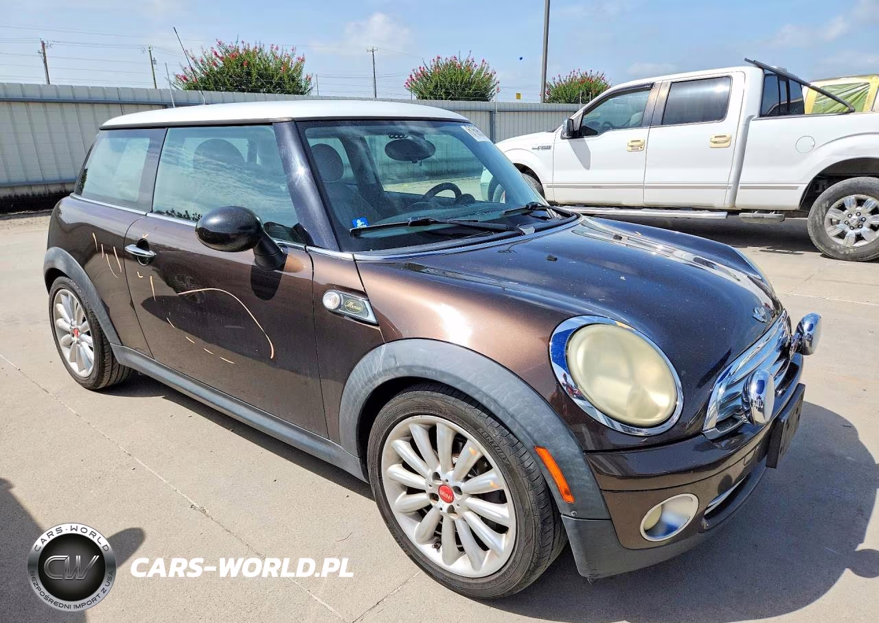 2010 Mini Cooper VIN:WMWMF3C53ATZ66607 - 4