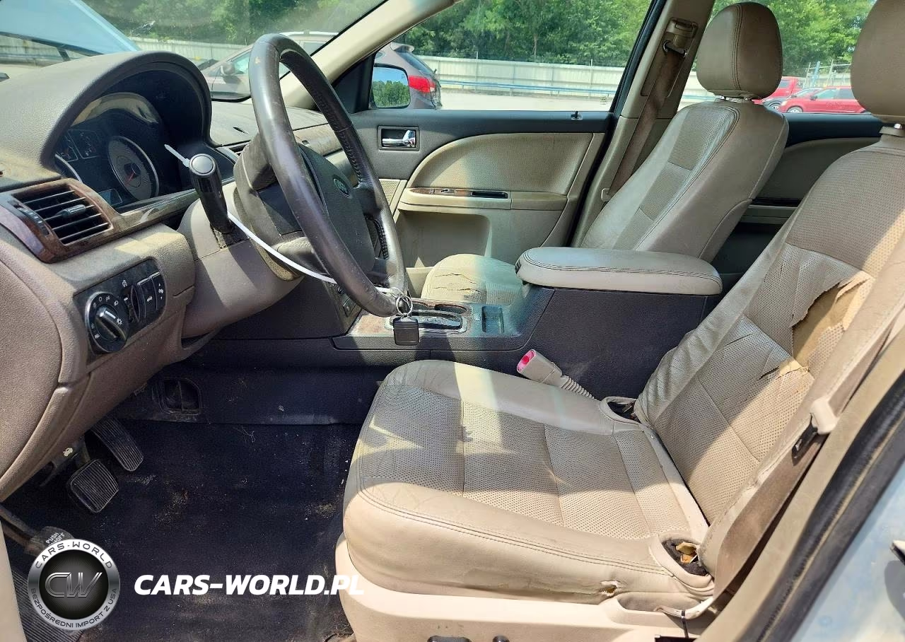 2009 Ford Taurus Limited VIN:1FAHP25W59G111628 - 7