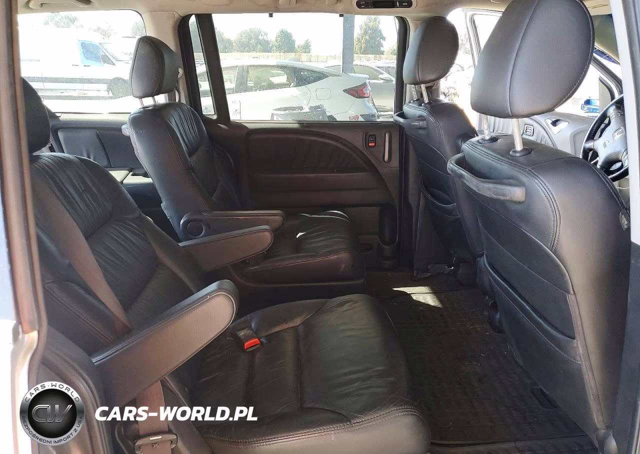 2010 Honda Odyssey Touring VIN:5FNRL3H96AB063027 - 10