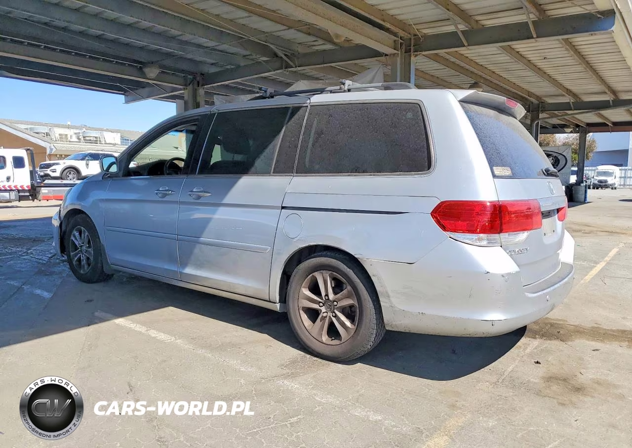 2010 Honda Odyssey Touring VIN:5FNRL3H96AB063027 - 2