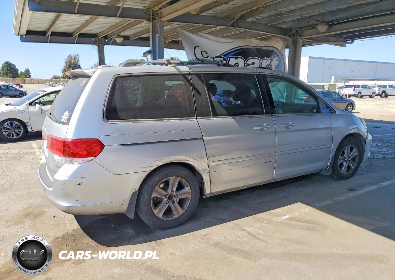 2010 Honda Odyssey Touring VIN:5FNRL3H96AB063027 - 3
