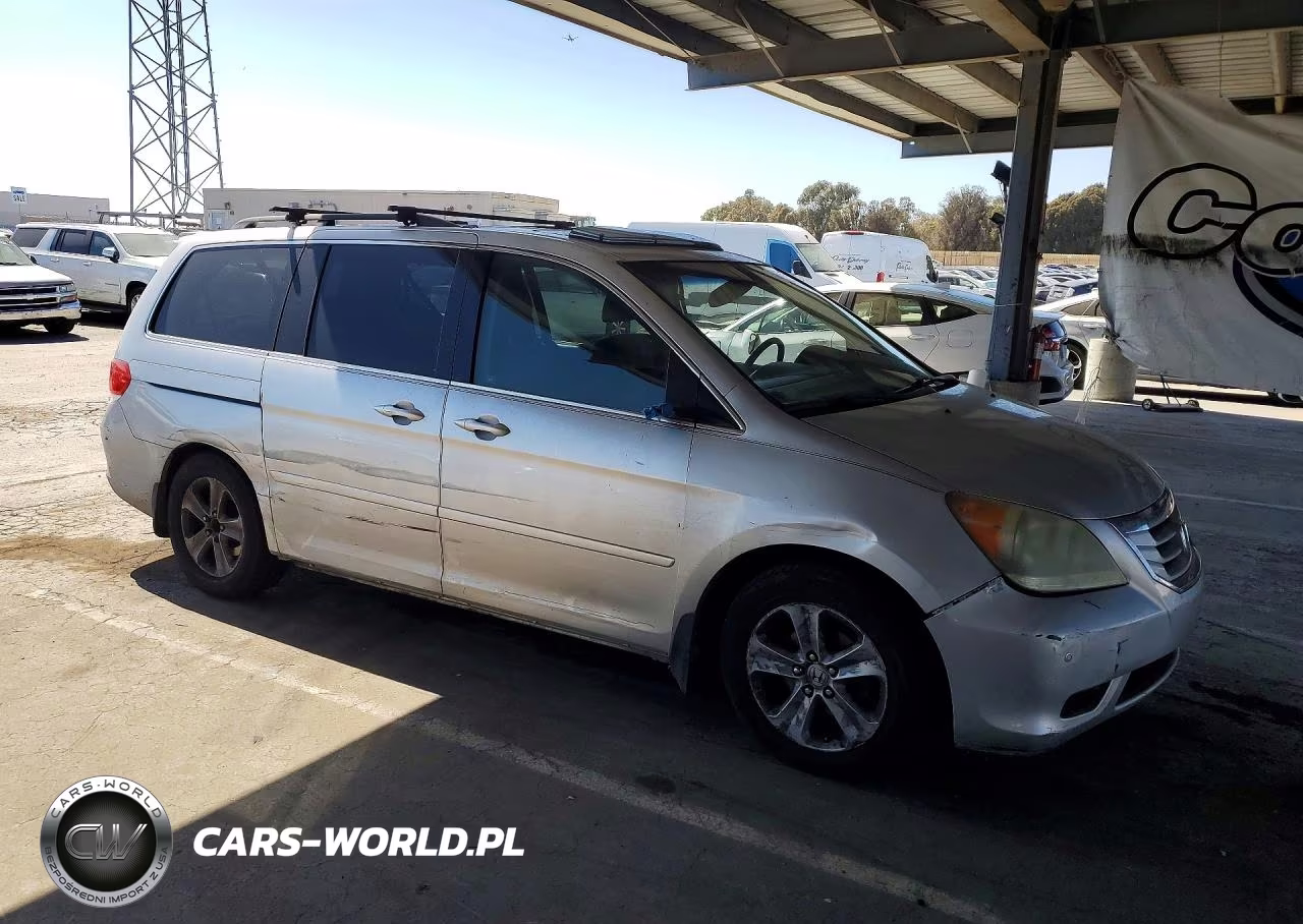 2010 Honda Odyssey Touring VIN:5FNRL3H96AB063027 - 4