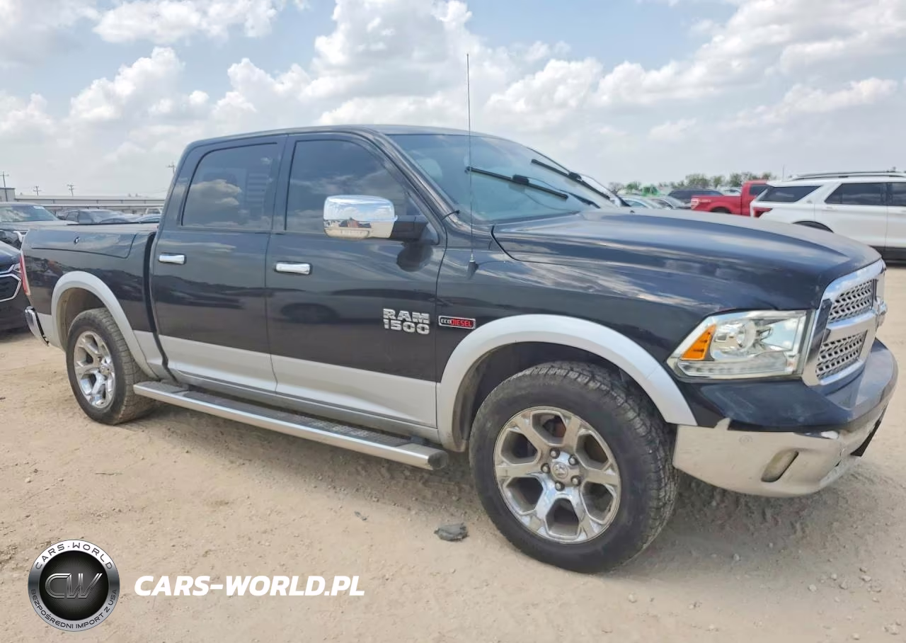 2015 Ram 1500 Laramie VIN:1C6RR6NMXFS590014 - 4