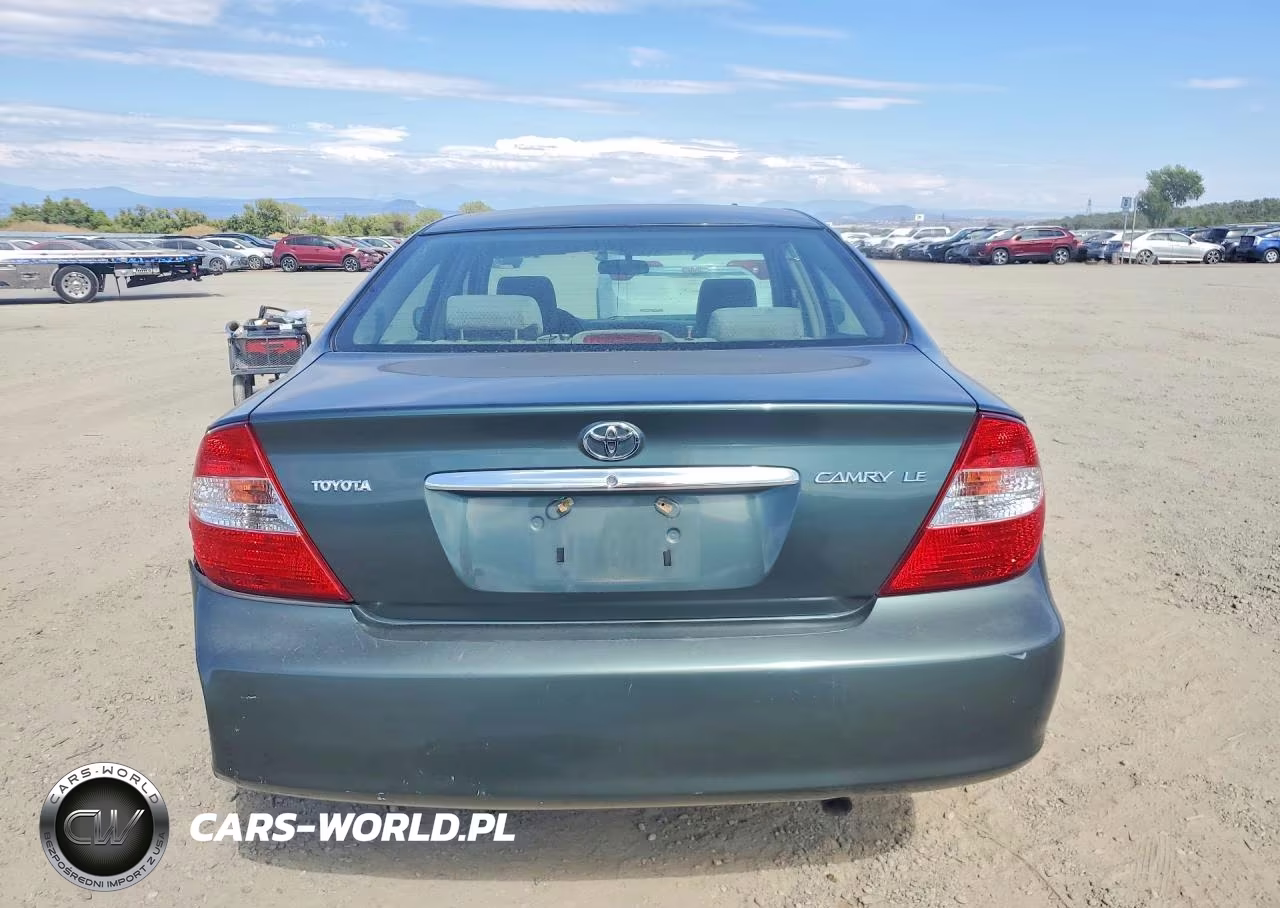 2002 Toyota Camry Le VIN:JTDBE32K320069438 - 6