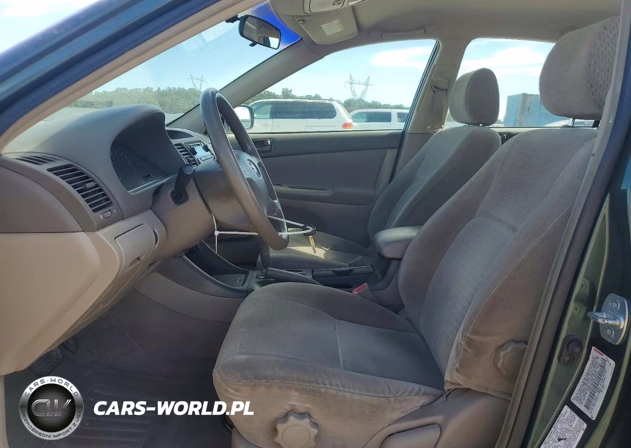 2002 Toyota Camry Le VIN:JTDBE32K320069438 - 7