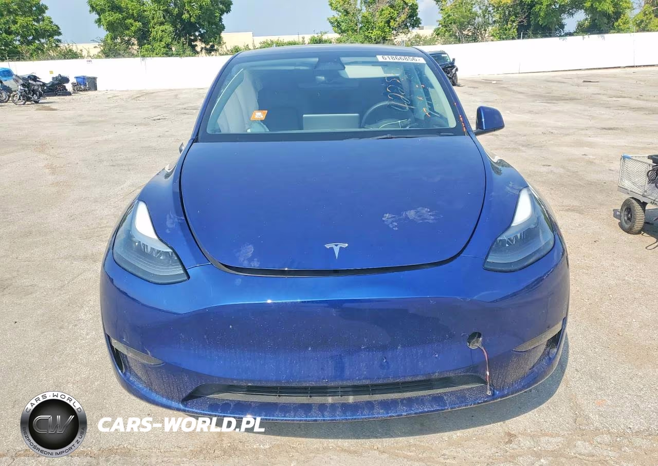 2023 Tesla Model Y VIN:7SAYGAEE2PF670690 - 5