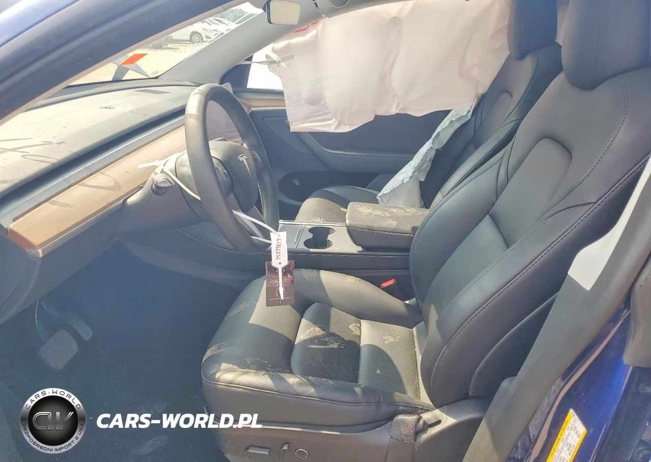 2023 Tesla Model Y VIN:7SAYGAEE2PF670690 - 7