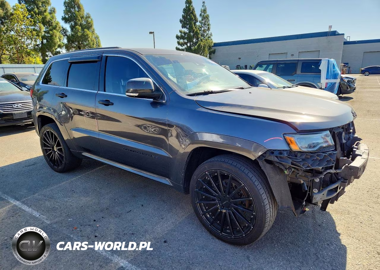 2015 Jeep Grand Cherokee Overland VIN:1C4RJECG1FC144237 - 4