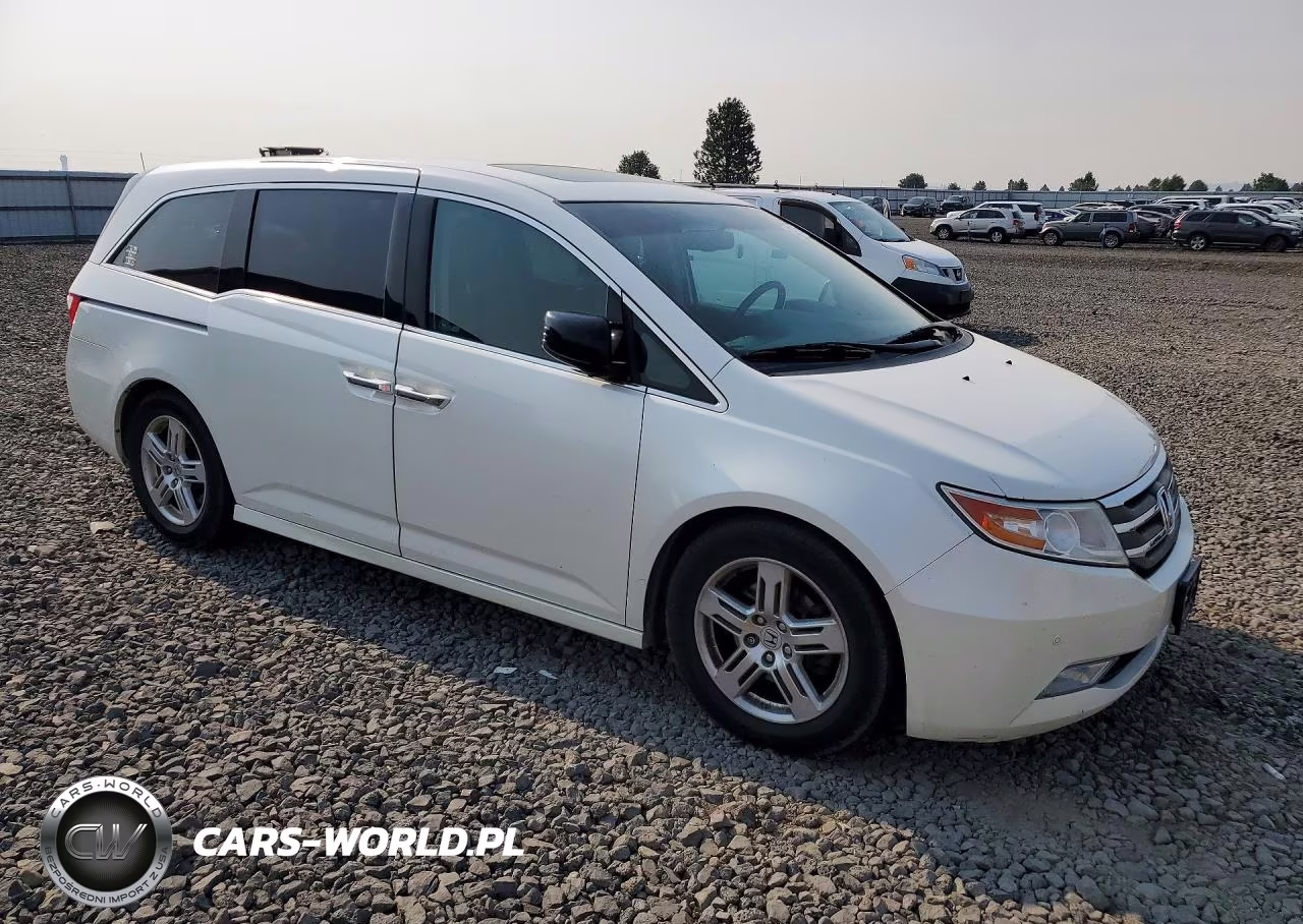 2012 Honda Odyssey Touring VIN:5FNRL5H95CB090315 - 4