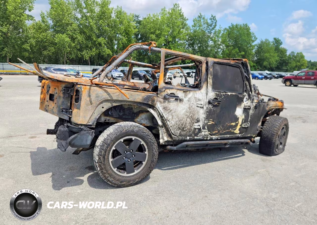 2012 Jeep Wrangler Unlimited Sahara VIN:1C4BJWEG5CL268432 - 3