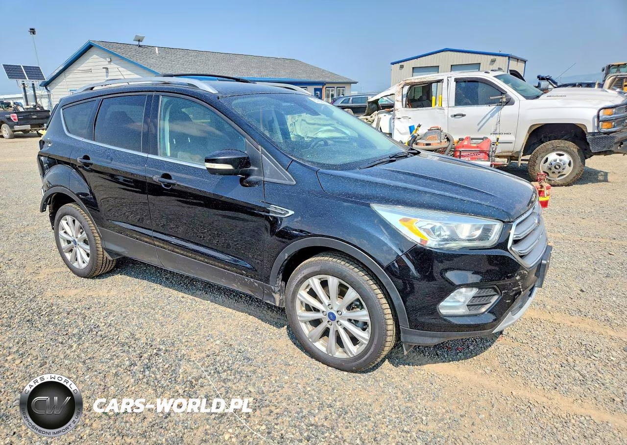 2017 Ford Escape Titanium VIN:1FMCU9J99HUC96266 - 4