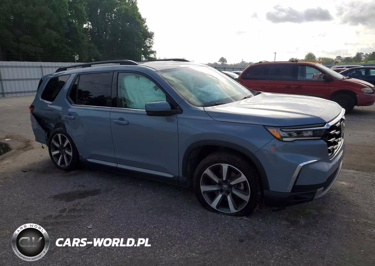 2023 Honda Pilot Touring VIN:5FNYG1H77PB005438 - 4