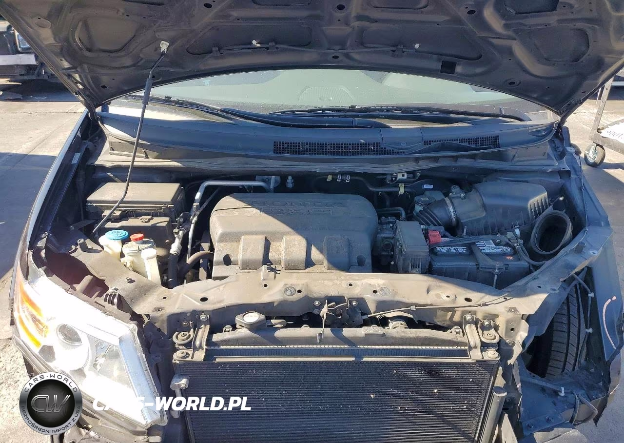 2012 Honda Odyssey Touring VIN:5FNRL5H97CB085617 - 12