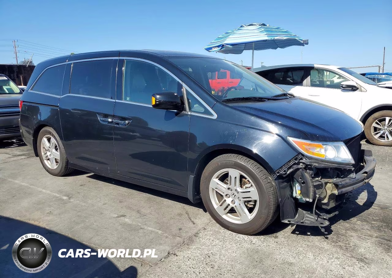 2012 Honda Odyssey Touring VIN:5FNRL5H97CB085617 - 4