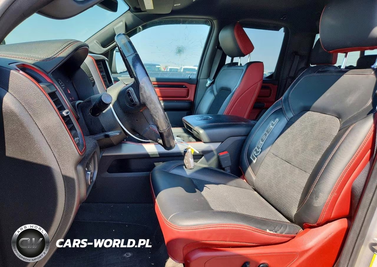 2019 Ram 1500 Rebel VIN:1C6SRFET9KN834446 - 7